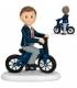 Figura comunión niño en bicicleta