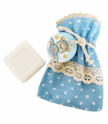 Bolsa de tela azul con jabon y etiqueta mi bautizo